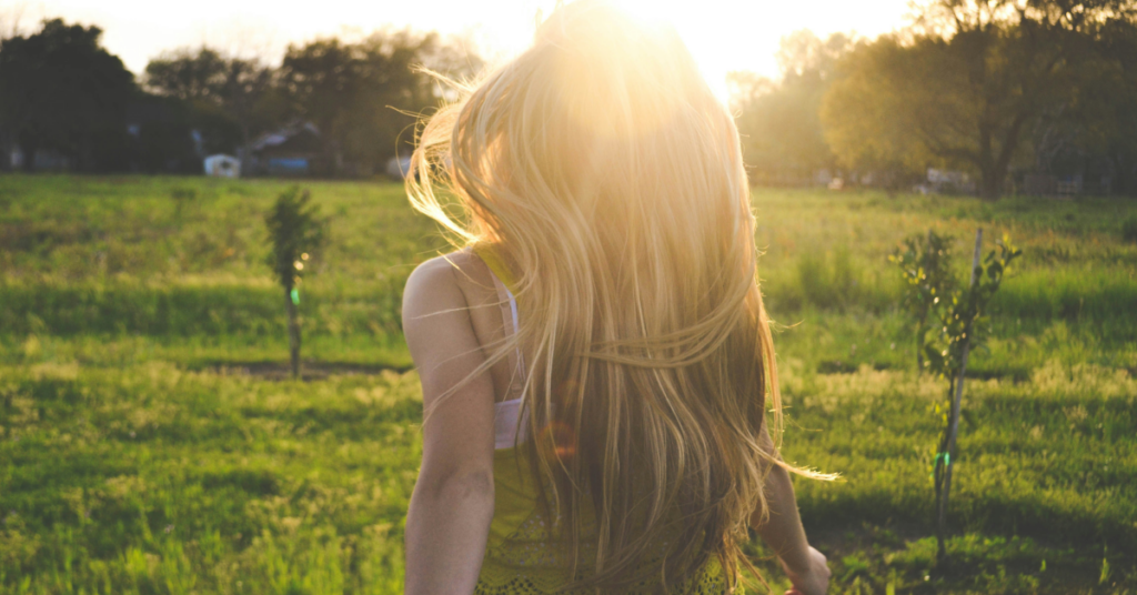 Safety and Side Effects of Ketamine Therapy. Girl running towards the sun.